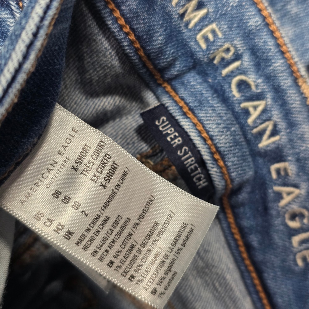 American Eagle Boot Cut Low Rise Super Stretch Medium Wash Jeans - Size 00 - Picture 3 of 6